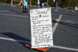 Poster attached to cone showing foursquare rules